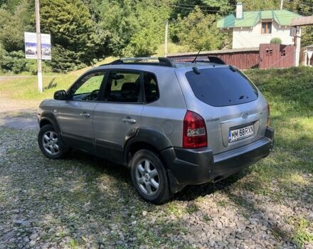 Сірий Хендай Туксон, об'ємом двигуна 2 л та пробігом 366 тис. км за 3650 $, фото 5 на Automoto.ua
