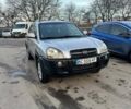 Серый Хендай Туксон, объемом двигателя 1.98 л и пробегом 220 тыс. км за 6800 $, фото 1 на Automoto.ua