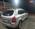 Серый Хендай Туксон, объемом двигателя 1.99 л и пробегом 210 тыс. км за 7900 $, фото 1 на Automoto.ua