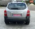 Серый Хендай Туксон, объемом двигателя 1.98 л и пробегом 243 тыс. км за 7100 $, фото 5 на Automoto.ua