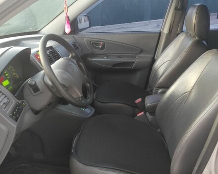 Серый Хендай Туксон, объемом двигателя 2.7 л и пробегом 258 тыс. км за 5800 $, фото 11 на Automoto.ua