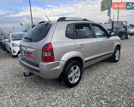 Серый Хендай Туксон, объемом двигателя 2 л и пробегом 155 тыс. км за 6989 $, фото 17 на Automoto.ua