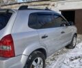 Сірий Хендай Туксон, об'ємом двигуна 1.98 л та пробігом 250 тис. км за 7900 $, фото 7 на Automoto.ua