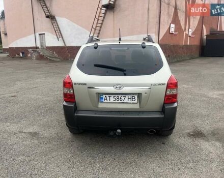 Серый Хендай Туксон, объемом двигателя 1.98 л и пробегом 205 тыс. км за 6700 $, фото 12 на Automoto.ua