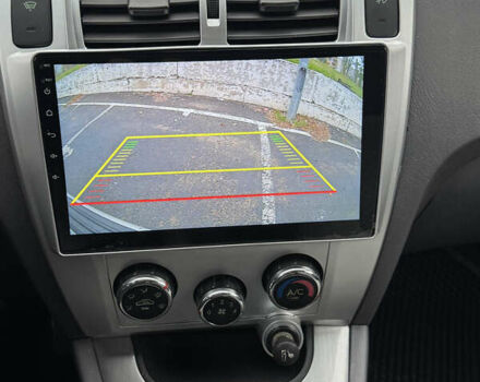 Серый Хендай Туксон, объемом двигателя 2 л и пробегом 163 тыс. км за 8350 $, фото 7 на Automoto.ua