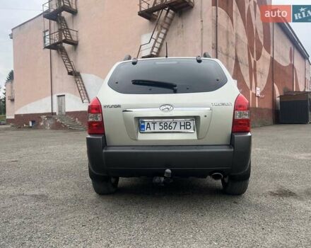 Серый Хендай Туксон, объемом двигателя 1.98 л и пробегом 205 тыс. км за 6700 $, фото 25 на Automoto.ua