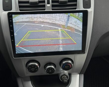 Серый Хендай Туксон, объемом двигателя 2 л и пробегом 163 тыс. км за 8350 $, фото 7 на Automoto.ua