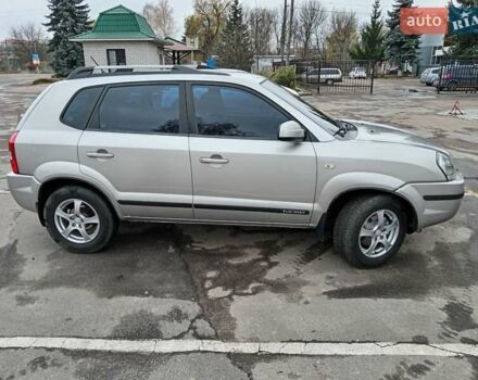 Серый Хендай Туксон, объемом двигателя 1.98 л и пробегом 267 тыс. км за 7200 $, фото 4 на Automoto.ua