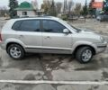 Серый Хендай Туксон, объемом двигателя 1.98 л и пробегом 267 тыс. км за 7200 $, фото 4 на Automoto.ua