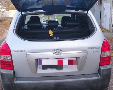 Серый Хендай Туксон, объемом двигателя 2 л и пробегом 264 тыс. км за 4500 $, фото 8 на Automoto.ua