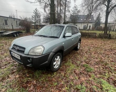 Серый Хендай Туксон, объемом двигателя 2 л и пробегом 84 тыс. км за 3100 $, фото 2 на Automoto.ua