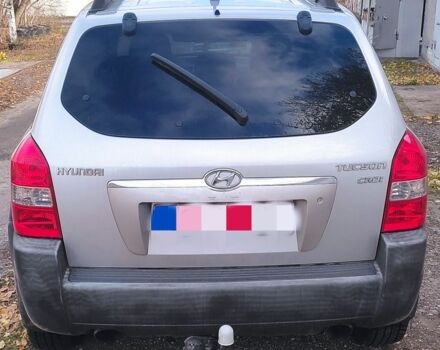 Серый Хендай Туксон, объемом двигателя 2 л и пробегом 264 тыс. км за 4500 $, фото 7 на Automoto.ua