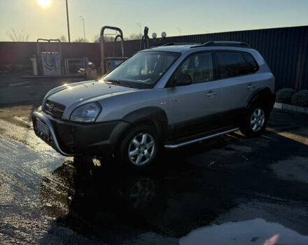 Серый Хендай Туксон, объемом двигателя 1.99 л и пробегом 215 тыс. км за 5980 $, фото 6 на Automoto.ua