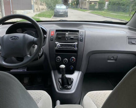 Серый Хендай Туксон, объемом двигателя 1.99 л и пробегом 194 тыс. км за 7850 $, фото 7 на Automoto.ua