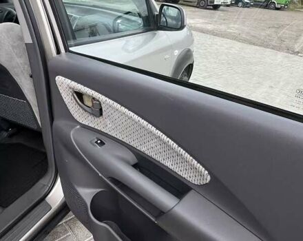 Серый Хендай Туксон, объемом двигателя 1.98 л и пробегом 243 тыс. км за 7100 $, фото 16 на Automoto.ua