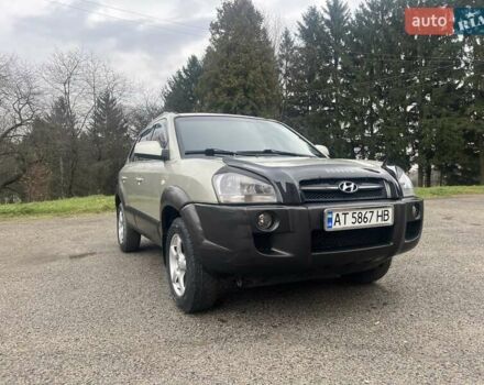 Серый Хендай Туксон, объемом двигателя 1.98 л и пробегом 205 тыс. км за 6700 $, фото 22 на Automoto.ua