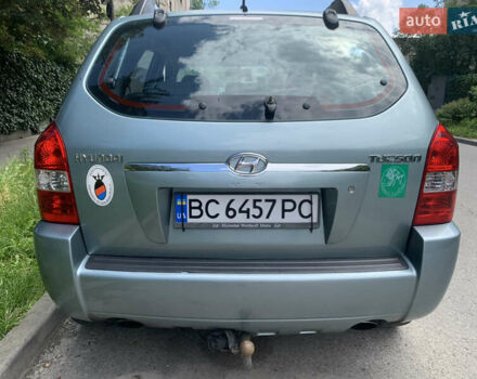 Серый Хендай Туксон, объемом двигателя 1.99 л и пробегом 194 тыс. км за 7850 $, фото 6 на Automoto.ua