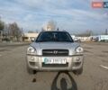 Серый Хендай Туксон, объемом двигателя 1.98 л и пробегом 181 тыс. км за 7000 $, фото 1 на Automoto.ua