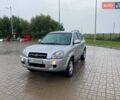 Серый Хендай Туксон, объемом двигателя 1.98 л и пробегом 230 тыс. км за 6700 $, фото 1 на Automoto.ua