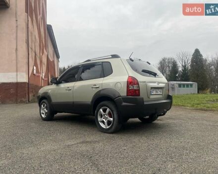 Серый Хендай Туксон, объемом двигателя 1.98 л и пробегом 205 тыс. км за 6700 $, фото 10 на Automoto.ua