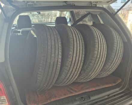 Сірий Хендай Туксон, об'ємом двигуна 2 л та пробігом 250 тис. км за 4132 $, фото 7 на Automoto.ua