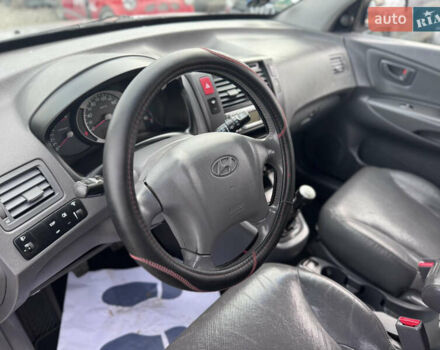 Серый Хендай Туксон, объемом двигателя 2 л и пробегом 155 тыс. км за 6989 $, фото 31 на Automoto.ua