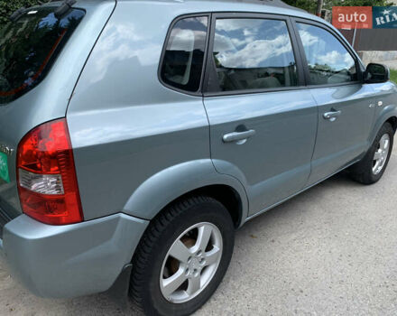 Серый Хендай Туксон, объемом двигателя 1.99 л и пробегом 194 тыс. км за 7850 $, фото 2 на Automoto.ua