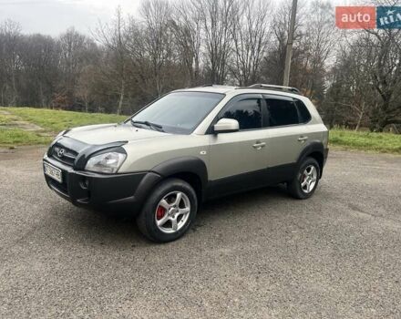 Серый Хендай Туксон, объемом двигателя 1.98 л и пробегом 205 тыс. км за 6700 $, фото 26 на Automoto.ua