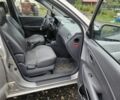 Сірий Хендай Туксон, об'ємом двигуна 2 л та пробігом 319 тис. км за 3550 $, фото 8 на Automoto.ua