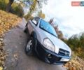Серый Хендай Туксон, объемом двигателя 2 л и пробегом 250 тыс. км за 6900 $, фото 2 на Automoto.ua