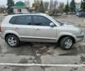 Серый Хендай Туксон, объемом двигателя 2 л и пробегом 267 тыс. км за 7200 $, фото 3 на Automoto.ua