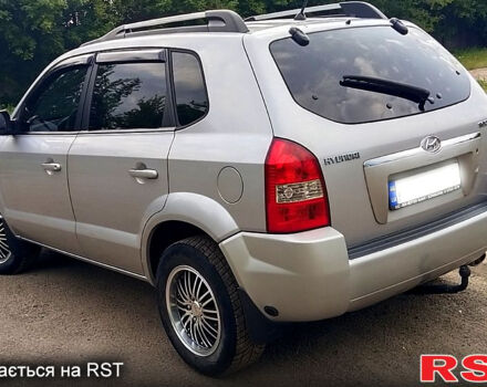 Серый Хендай Туксон, объемом двигателя 2 л и пробегом 249 тыс. км за 7550 $, фото 4 на Automoto.ua