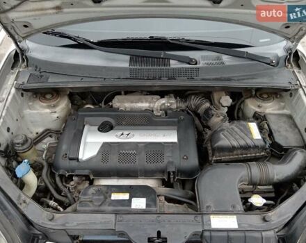 Серый Хендай Туксон, объемом двигателя 1.98 л и пробегом 267 тыс. км за 7200 $, фото 16 на Automoto.ua