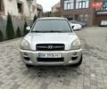 Серый Хендай Туксон, объемом двигателя 1.98 л и пробегом 274 тыс. км за 6800 $, фото 30 на Automoto.ua