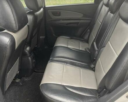 Серый Хендай Туксон, объемом двигателя 1.98 л и пробегом 269 тыс. км за 7300 $, фото 5 на Automoto.ua