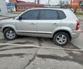 Серый Хендай Туксон, объемом двигателя 1.98 л и пробегом 267 тыс. км за 7200 $, фото 3 на Automoto.ua