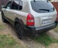 Сірий Хендай Туксон, об'ємом двигуна 1.99 л та пробігом 282 тис. км за 6200 $, фото 7 на Automoto.ua