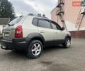 Серый Хендай Туксон, объемом двигателя 1.98 л и пробегом 205 тыс. км за 6700 $, фото 8 на Automoto.ua