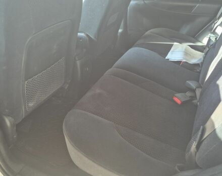 Сірий Хендай Туксон, об'ємом двигуна 2 л та пробігом 250 тис. км за 4132 $, фото 5 на Automoto.ua