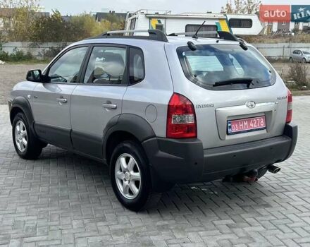 Серый Хендай Туксон, объемом двигателя 1.98 л и пробегом 243 тыс. км за 7100 $, фото 6 на Automoto.ua