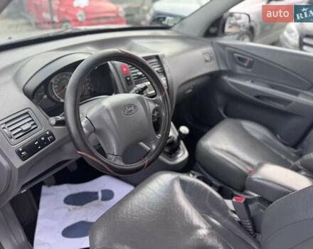 Серый Хендай Туксон, объемом двигателя 2 л и пробегом 155 тыс. км за 6989 $, фото 38 на Automoto.ua