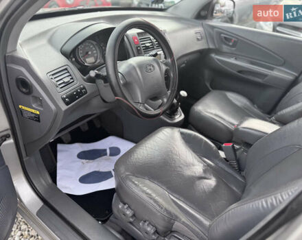 Серый Хендай Туксон, объемом двигателя 2 л и пробегом 155 тыс. км за 6989 $, фото 29 на Automoto.ua
