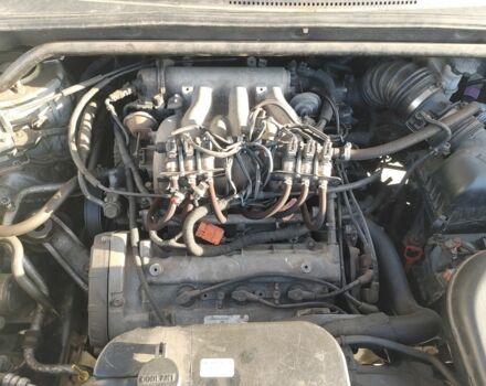 Серый Хендай Туксон, объемом двигателя 2.7 л и пробегом 258 тыс. км за 5800 $, фото 20 на Automoto.ua