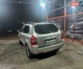 Серый Хендай Туксон, объемом двигателя 1.99 л и пробегом 210 тыс. км за 7900 $, фото 2 на Automoto.ua