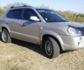 Сірий Хендай Туксон, об'ємом двигуна 1.98 л та пробігом 250 тис. км за 7200 $, фото 1 на Automoto.ua