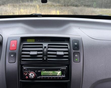 Сірий Хендай Туксон, об'ємом двигуна 2 л та пробігом 187 тис. км за 7650 $, фото 13 на Automoto.ua