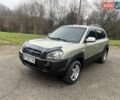 Серый Хендай Туксон, объемом двигателя 1.98 л и пробегом 205 тыс. км за 6700 $, фото 2 на Automoto.ua