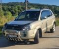 Серый Хендай Туксон, объемом двигателя 1.98 л и пробегом 322 тыс. км за 6100 $, фото 13 на Automoto.ua