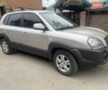 Серый Хендай Туксон, объемом двигателя 2 л и пробегом 222 тыс. км за 8500 $, фото 1 на Automoto.ua