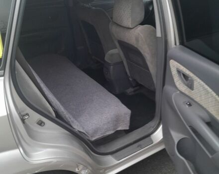 Сірий Хендай Туксон, об'ємом двигуна 2 л та пробігом 310 тис. км за 3884 $, фото 11 на Automoto.ua